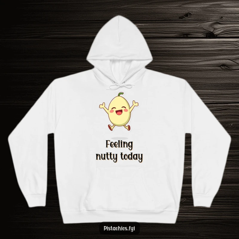 Funny and cozy hoodie showcasing a happy pistachio character leaping with excitement, perfect for lounging or casual wear.