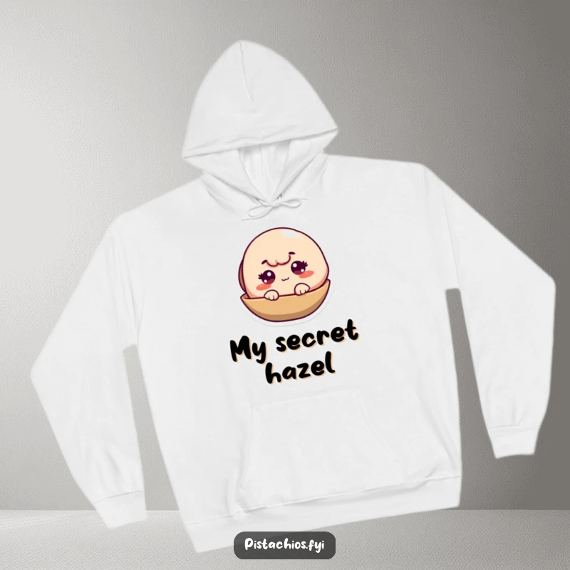 Funny Pistachio Shell Hoodie showing a sly character peeking out and winking, offering comfort and humor.