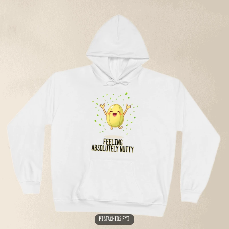 Funny hoodie with a cheerful pistachio nut leaping joyfully amidst green confetti, radiating warmth and humorous celebration.