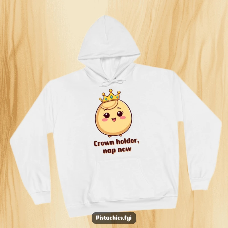 Funny crowned nut hoodie, happy nut character wearing a tiny crown and beaming, warm and humorous apparel for royalty.