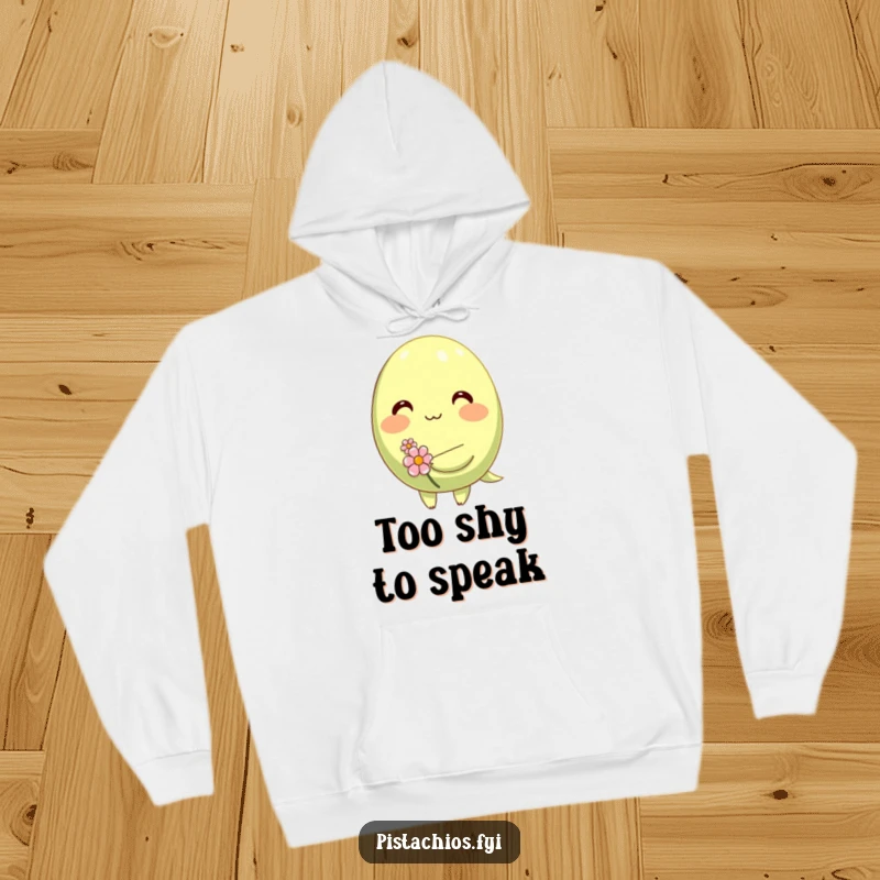 Funny hoodie displaying a shy, blushing pistachio character clutching a small, delicate flower, embodying sweet, quiet humor.